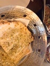 Slices of garlic cheese naan on a silver plate Royalty Free Stock Photo