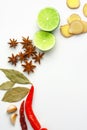 Slices ginger and lime with spice on white background