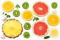 slices of grapefruit, kiwi fruit, orange and pineapple isolated on white background top view healthy background Royalty Free Stock Photo