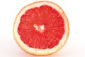 Slices of grapefruit macro closeup on white background Royalty Free Stock Photo