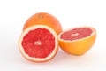 Slices of grapefruit macro closeup on white background Royalty Free Stock Photo