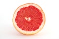 Slices of grapefruit macro closeup on white background Royalty Free Stock Photo
