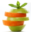 Slices green apple and orange Royalty Free Stock Photo