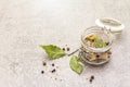 Slices of herring with spices in a glass jar Royalty Free Stock Photo