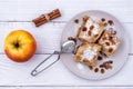 Slices of homemade Apple pie strudel in a plate on a wooden table Royalty Free Stock Photo
