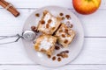 Slices of homemade Apple pie strudel in a plate on a wooden table Royalty Free Stock Photo