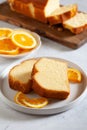 Slices of homemade cake with oragnic oranges Royalty Free Stock Photo