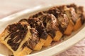 Slices of homemade chocolate marble cake on a porcelain plate