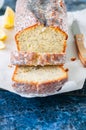 Homemade lemon poppy seed pound cake on a wire rack. Blue stone Royalty Free Stock Photo