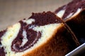 Slices of homemade marble cake on a white plate wi