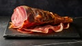 Slices of jamon serrano ham or prosciutto crudo parma on Wooden background. Top view