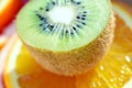 Slices of kiwi fruit, orange, grapefruit from above, macro Royalty Free Stock Photo