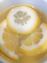 Slices of lemon and hot water Royalty Free Stock Photo