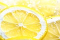 Slices of lemon in water with air bubbles Royalty Free Stock Photo