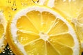 Slices of lemon in water with air bubbles Royalty Free Stock Photo