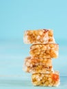 Slices of muesli bar on blue background Royalty Free Stock Photo