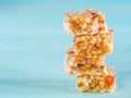 Slices of muesli bar on blue background Royalty Free Stock Photo