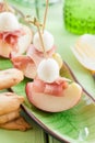 Slices of nectarine with smoked ham Royalty Free Stock Photo