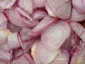 Slices of onion texture, cooking ingredients background Royalty Free Stock Photo