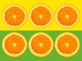 Slices of orange fruit isolated on colorful yellow and green pastel background - fresh modern minimalistic and creative image