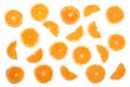 Slices of orange or tangerine isolated on white background. Flat lay, top view. Fruit composition Royalty Free Stock Photo