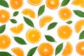 Slices of orange or tangerine with leaves isolated on white background. Flat lay, top view. Fruit composition Royalty Free Stock Photo
