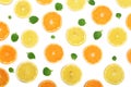 Slices of orange or tangerine and lemon with mint leaves isolated on white background. Flat lay, top view Royalty Free Stock Photo