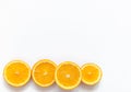 Slices of orange on a white background. Fruit with vitamins. Tablets with vitamin C against colds. Exotic tropical fruit for juice Royalty Free Stock Photo