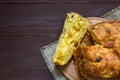 Slices of panettone with fruits and nuts, italian Christmas dessert