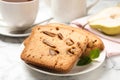 Slices of pear bread on white marble table, closeup. Homemade cake Royalty Free Stock Photo