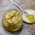 Slices of pickled cucumbers with pepper and mustard Royalty Free Stock Photo