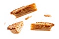slices of pie hovering in mid-air, highlighting the textures and flavors.