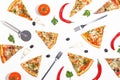 Slices of pizza, ingredients and cutlery on a white background. Top view Royalty Free Stock Photo