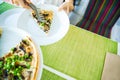 slices of pizza. Table with pizza in a restaurant. Pizza close up on a green