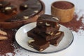 Slices of Ragi Halwa served in a round wooden tray