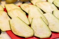 Slices of raw eggplant, brinjal or aubergine