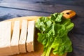 Slices of raw tofu and spinach Royalty Free Stock Photo