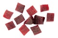 Slices of red boiled beets isolated on white background, top view. Heap of chopped boiled beets on a white background