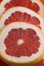 Slices of red grapefruit close up