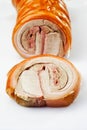 Slices of roasted rolled roast, suckling pig Royalty Free Stock Photo