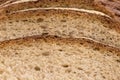 Slices of rye wheat bread, bread crust, close up Royalty Free Stock Photo