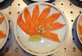 Slices salmon sashimi on white plate