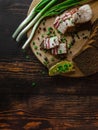 Slices of salted fat on bread with mustard and green onions. Royalty Free Stock Photo