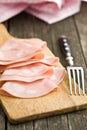 Slices of Sausage Mortadella on cutting board Royalty Free Stock Photo