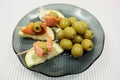 Slices of a smoked humpback salmon with olives and a lemon Royalty Free Stock Photo