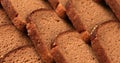 Slices of stacked brown bread Royalty Free Stock Photo