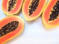 Slices of sweet papaya on white background Royalty Free Stock Photo