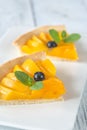 Slices of tart with peaches and blueberry Royalty Free Stock Photo