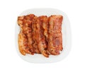 Slices of tasty fried bacon on white background Royalty Free Stock Photo