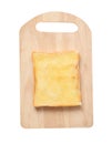 Slices toast bread on cutting board on white background Royalty Free Stock Photo